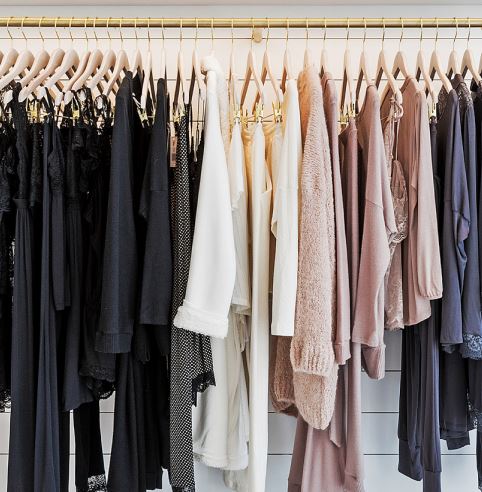 pajamas and loungewear hanging on a clothes rack