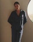 Model is wearing Inez Washable Silk Long PJ Set in navy/ivory.