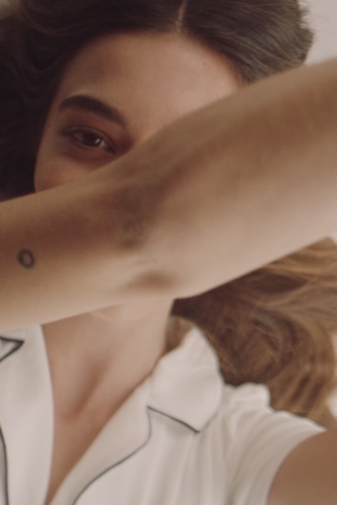 Model wears Gisele TENCEL™ Modal Relaxed Short PJ Set in pure ivory/navy.