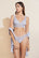 Model wears Mariana Thong in Ice Blue.