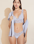 Model wears Mariana Bralette in Ice Blue.