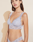Model wears Mariana Bralette in Ice Blue.