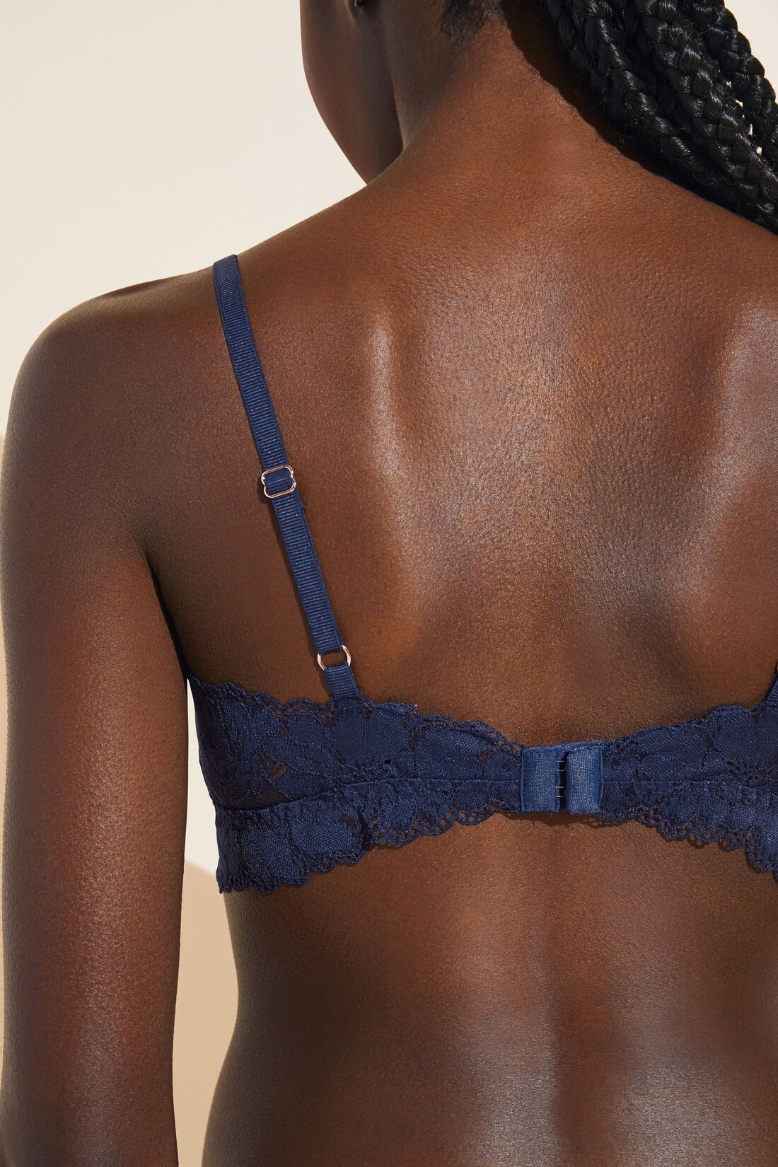 Model wears Rosalia TENCEL™ Modal Bralette in Navy.