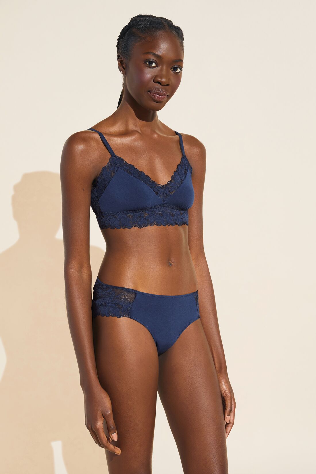 Model wears Rosalia TENCEL™ Modal Bralette in Navy.