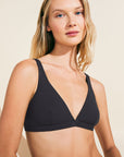 Model wears Pima Stretch Cotton V Bralette in Black.