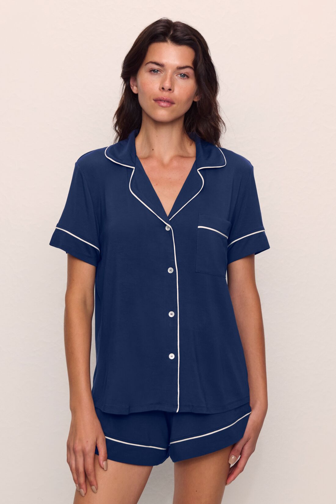 Model wearing the Eberjey Gisele TENCEL™ Modal Relaxed Short PJ Set in Navy/Ivory, a roomy set for a growing bump