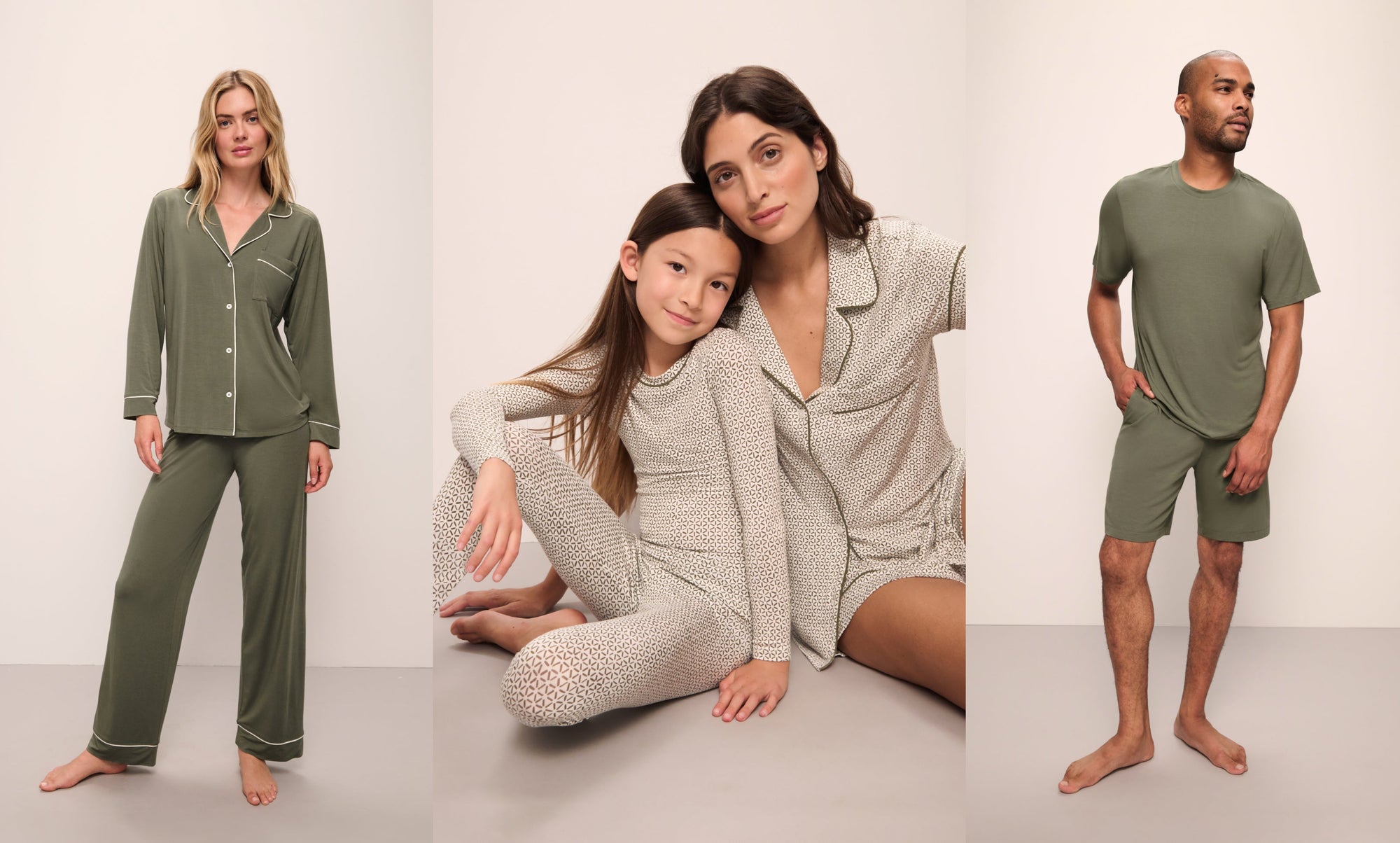 Models wearing the gisele long pj in moss, the kids long pj in ella sparks spring, and henry short pj in moss.