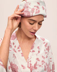 Model is wearing Inez Washable Silk Printed Eye Mask in Ikebana Pearl
