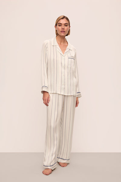 Model is wearing Inez Washable Silk Printed Long Pj Set in Serene Stripe Navy/Navy