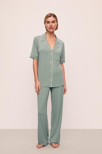 Model is wearing Gisele TENCEL™ Modal Short Sleeve & Pant PJ Set in Eucalyptus/Ivory