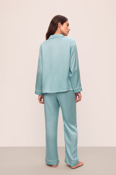 Model is wearing Inez Washable Silk Long Pj Set in Canal Blue/Ivory