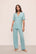 Model is wearing Gisele Tencel™ Modal Short Sleeve & Pant Pj Set in Canal Blue/Ivory