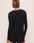 Model is wearing Gisele Tencel™ Modal Long Sleeve in Black
