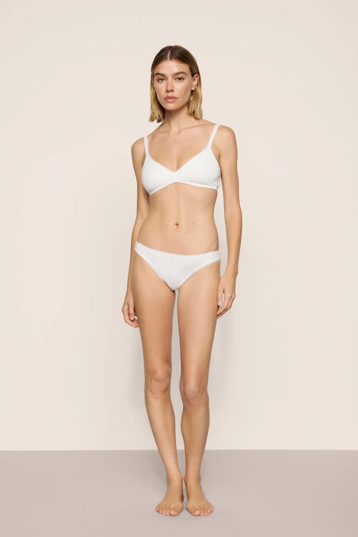 Model is wearing Pima Cotton Bralette in White