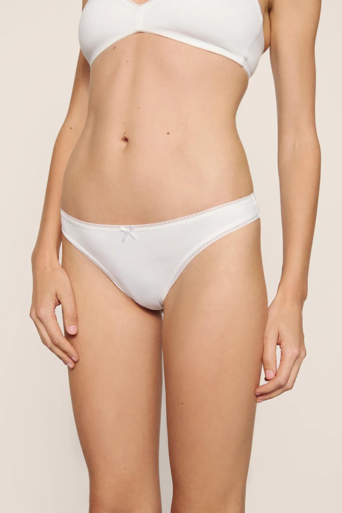 Model is wearing Pima Cotton Thong in White