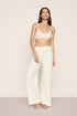 Model is wearing Pointelle Sweater Bralette  in  Ivory