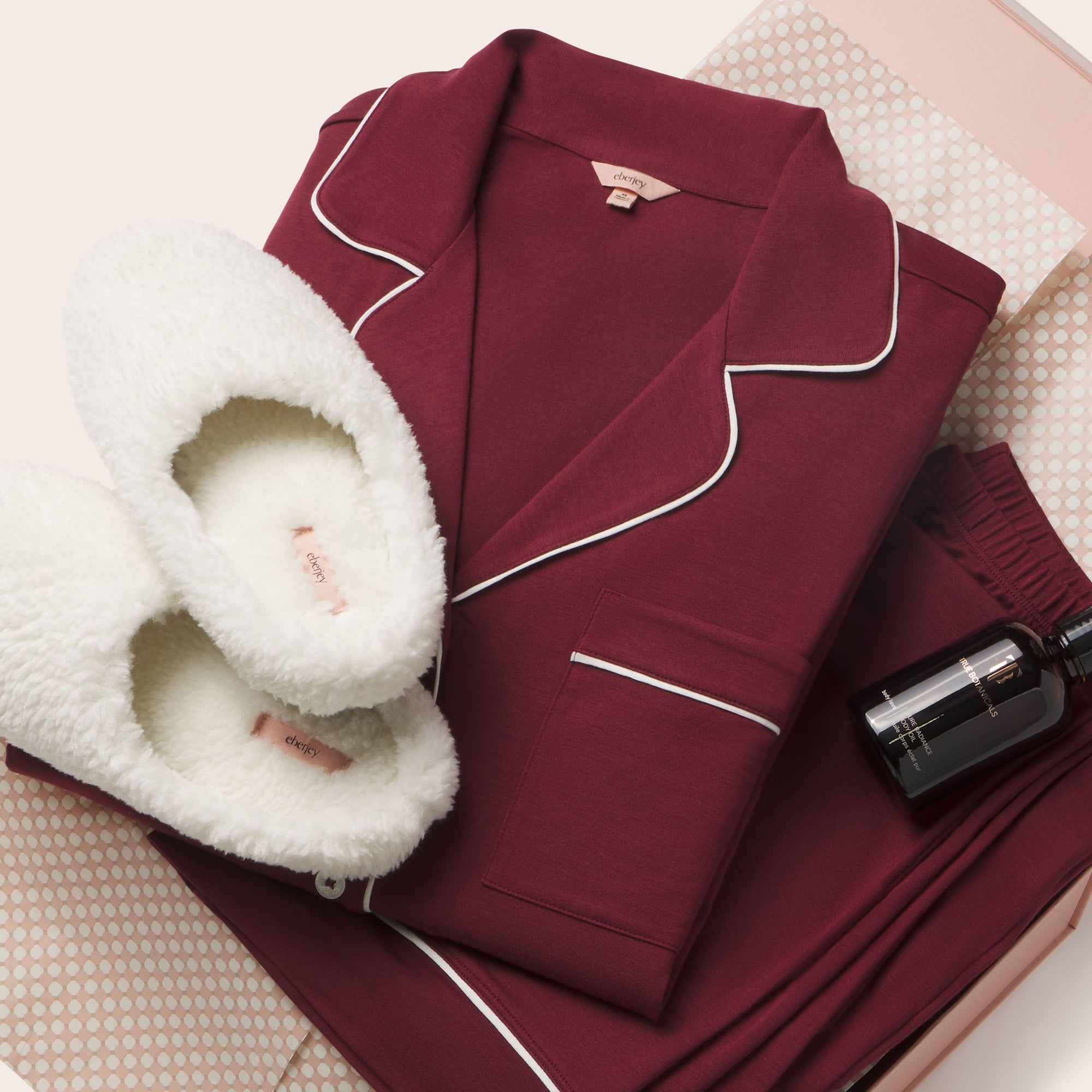 Perfect gift bundle featuring Gisele PJs, Sherpa slippers and Body Oil