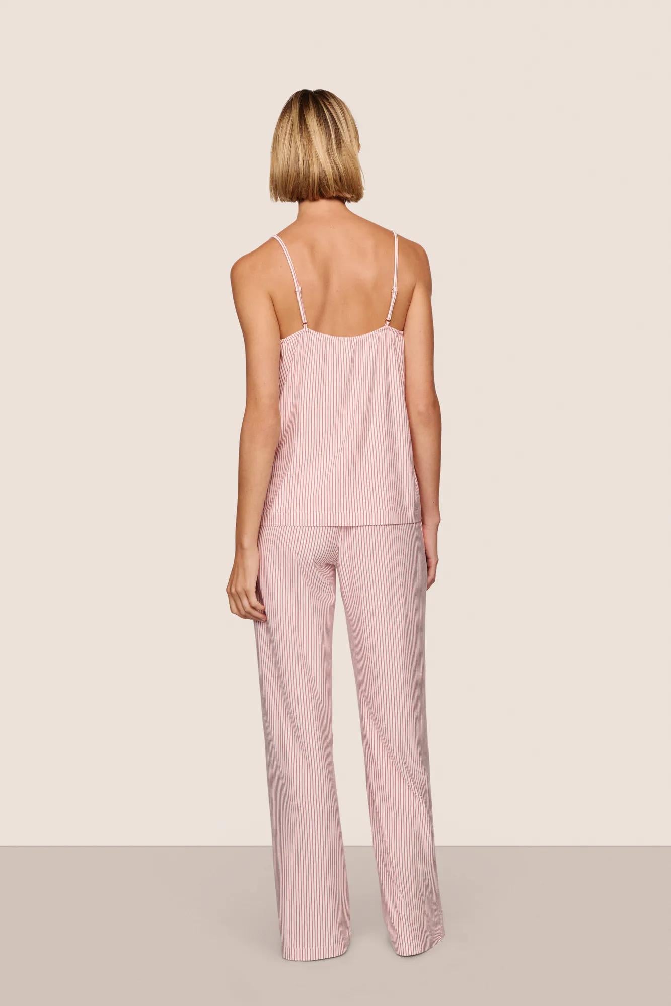 Model is wearing Gisele Printed TENCEL™ Modal Cami & Pant PJ Set  in Duo Stripe Holly Red