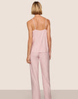 Model is wearing Gisele Printed TENCEL™ Modal Cami & Pant PJ Set  in Duo Stripe Holly Red