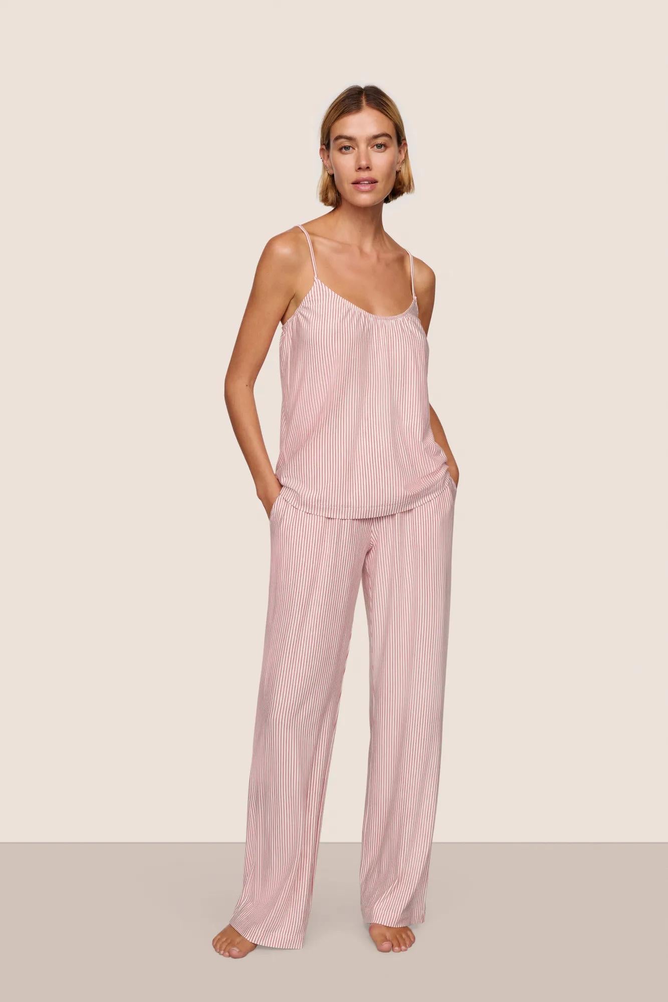 Model is wearing Gisele Printed TENCEL™ Modal Cami & Pant PJ Set  in Duo Stripe Holly Red