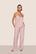 Model is wearing Gisele Printed TENCEL™ Modal Cami & Pant PJ Set  in Duo Stripe Holly Red