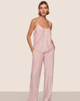 Model is wearing Gisele Printed TENCEL™ Modal Cami & Pant PJ Set  in Duo Stripe Holly Red