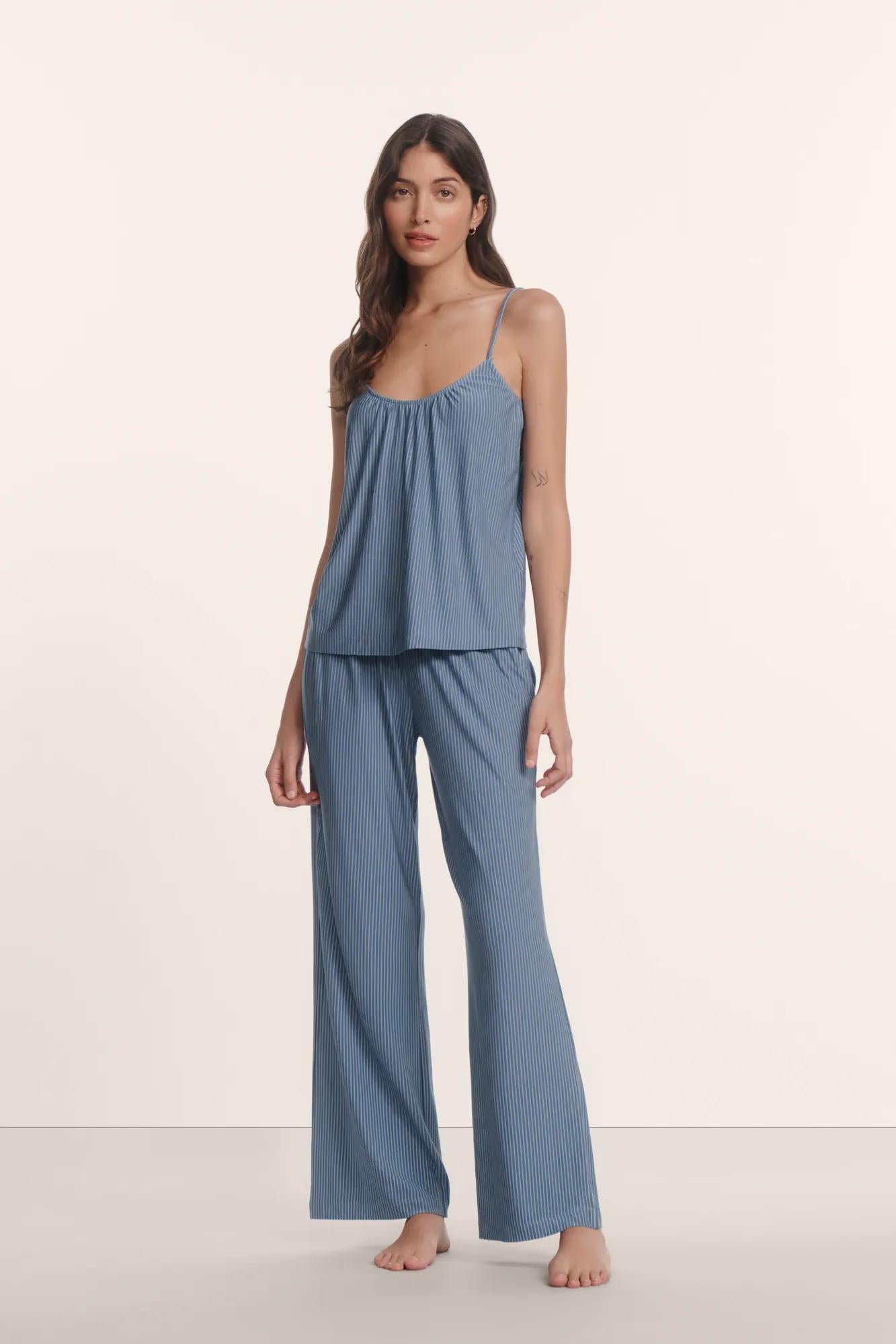 Model is wearing Gisele Printed TENCEL™ Modal Cami & Pant PJ Set in Duo Stripe Slate Blue