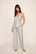 Model is wearing Gisele Printed TENCEL™ Modal Cami & Pant PJ Set in Duo Stripe Ivory