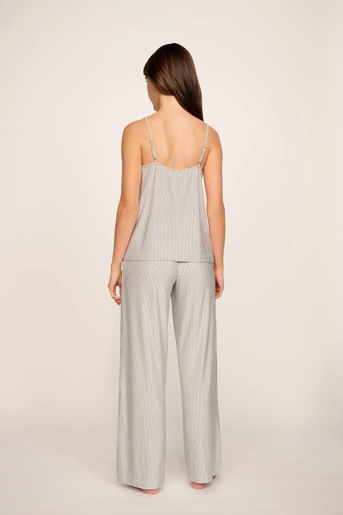 Model is wearing Gisele Printed TENCEL™ Modal Cami & Pant PJ Set in Duo Stripe Ivory