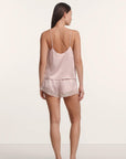 Model is wearing Washable Silk Lace Cami & Short Set in Pale Pink/Champagne
