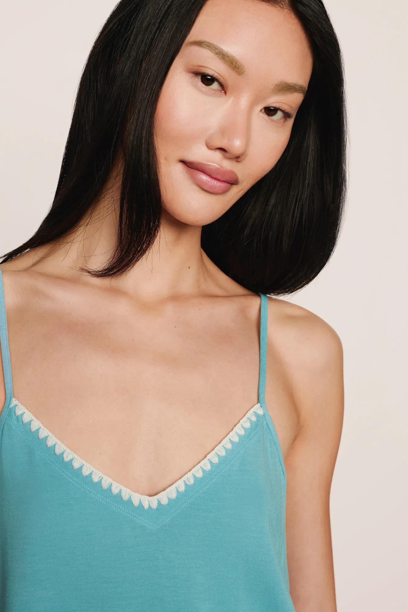 Model is wearing Frida TENCEL™ Modal Cami & Pant PJ Set  in Blue Lagoon/Ivory