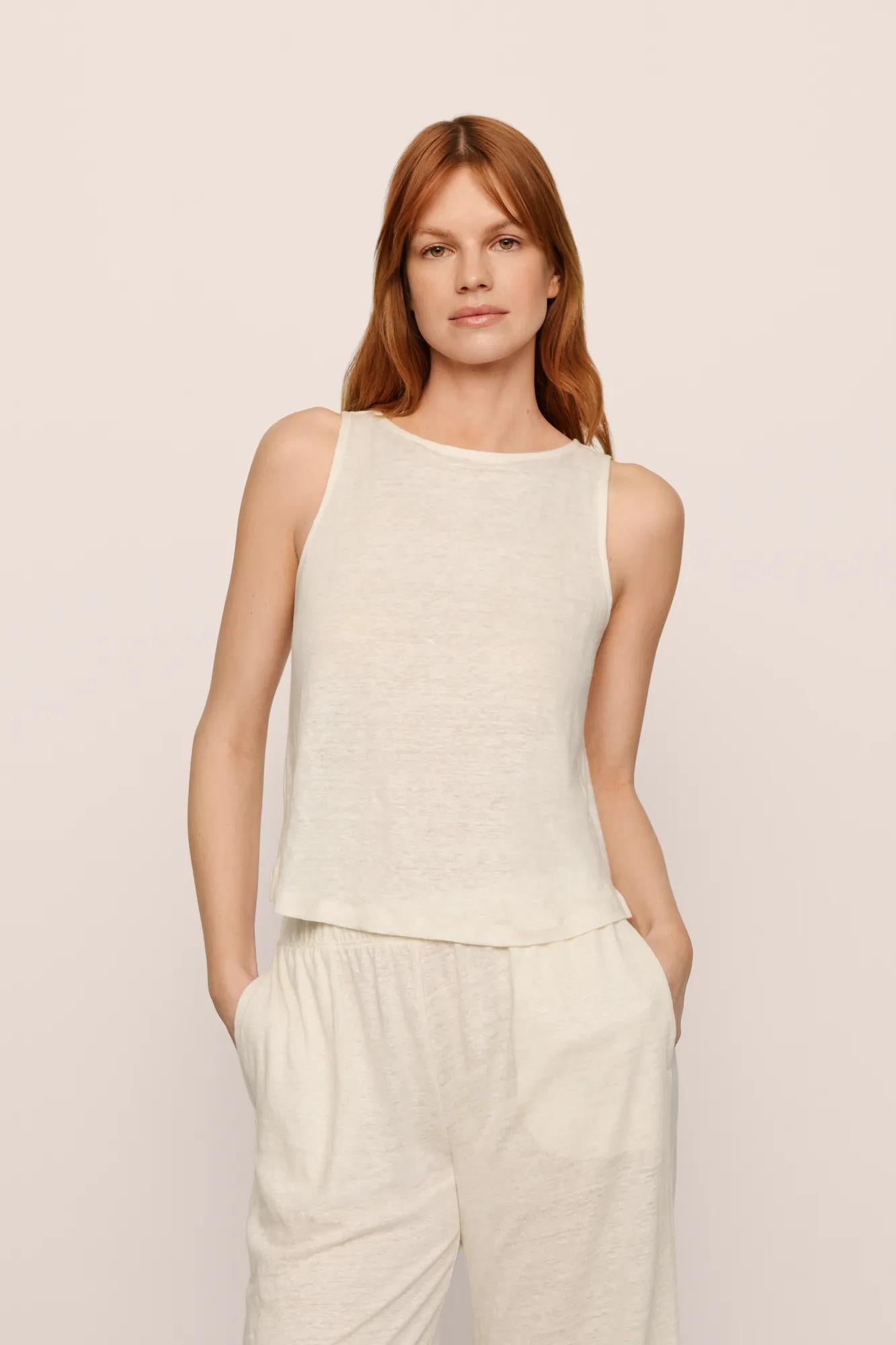 Model is wearing Organic Linen Knit Boat Neck Crop Tank in Ivory