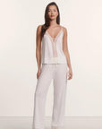 Model is wearing Lara TENCEL™ Modal Cami & Pant PJ Set in Ivory
