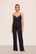 Model is wearing Kari TENCEL™ Modal Cami & Pant PJ Set  in Black
