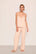 Model is wearing Kari TENCEL™ Modal Cami & Pant PJ Set  in Tea Rose