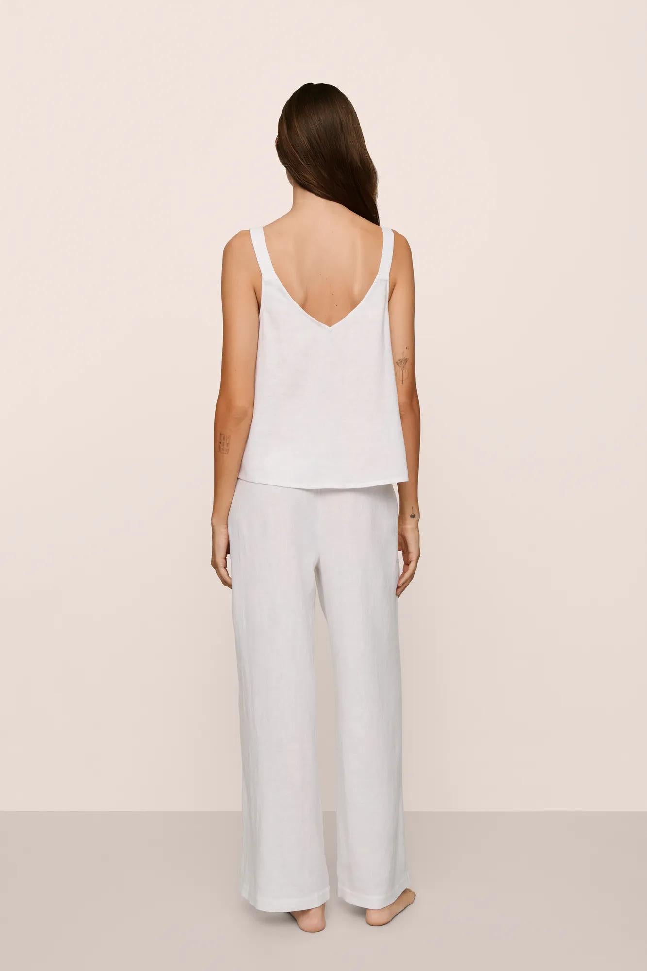 Model is wearing Linen Blend V Neck Cami in White