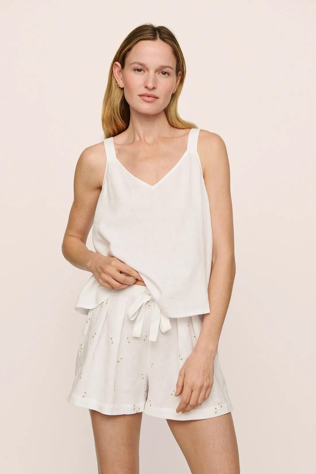 Model is wearing Linen Blend V Neck Cami in White