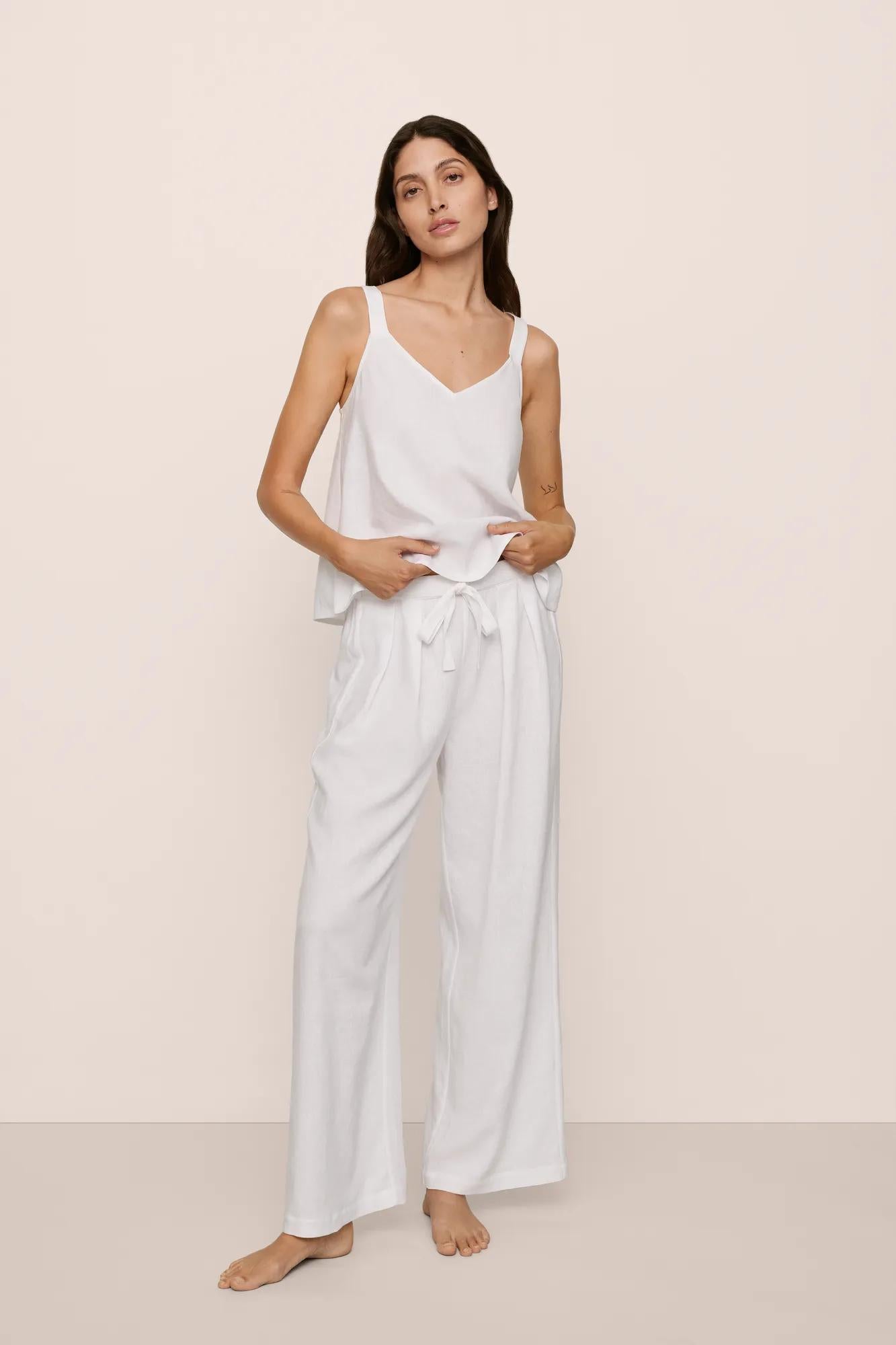 Model is wearing Linen Blend V Neck Cami in White