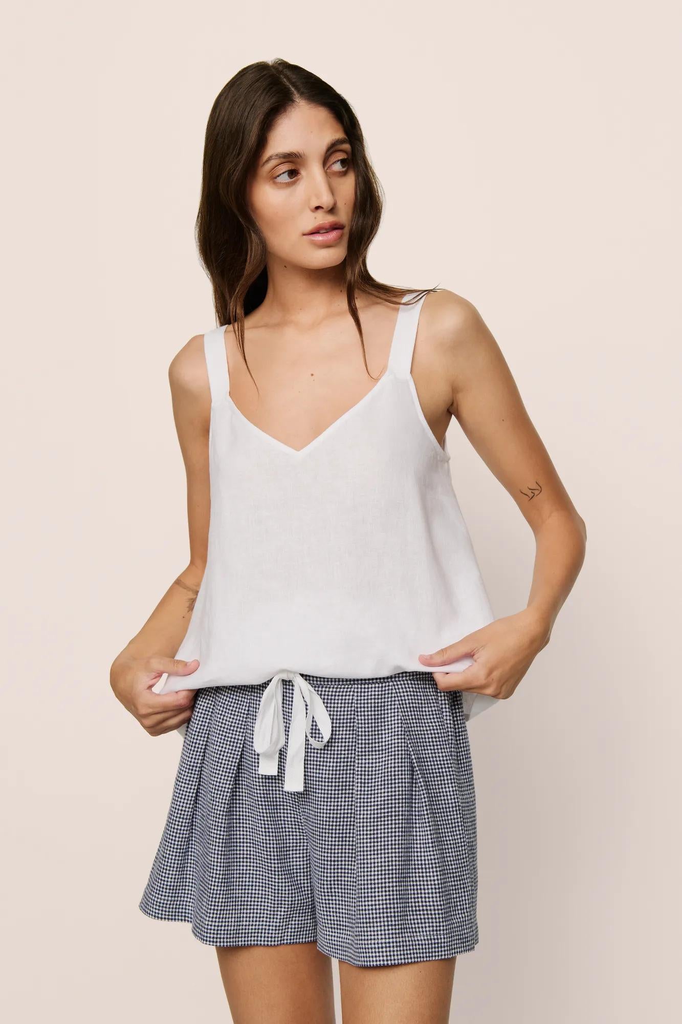 Model is wearing Linen Blend V Neck Cami in White