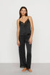Model is wearing Washable Silk with Lace Embroidery Cami & Pant PJ Set in Black