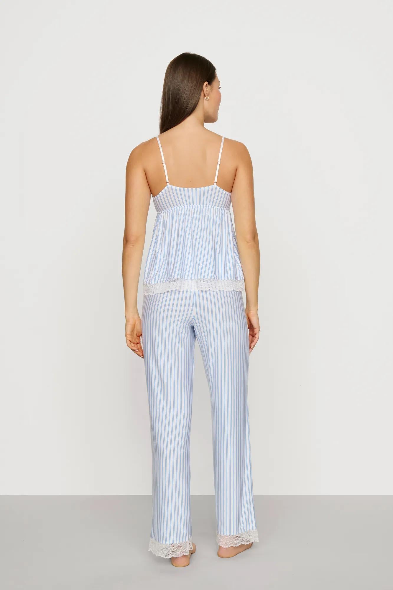 Model is wearing Washable Silk with Lace Embroidery Cami & Pant PJ Set in Powder Blue