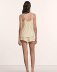 Model is wearing Gisele TENCEL™ Modal Ruffle Cami & Shortie Short Set in Buttercream