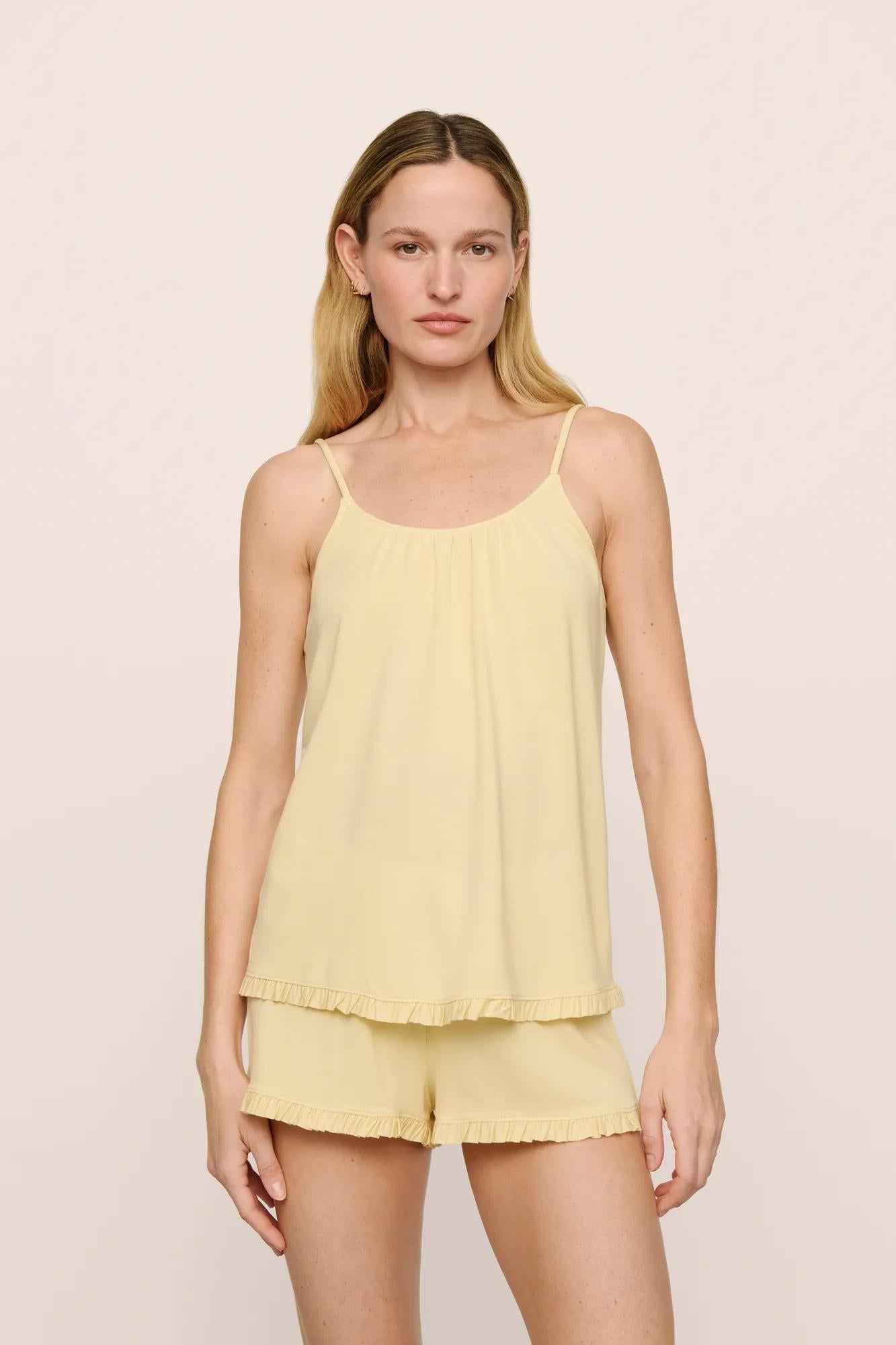 Model is wearing Gisele TENCEL™ Modal Ruffle Cami & Shortie Short Set in  Sunrise