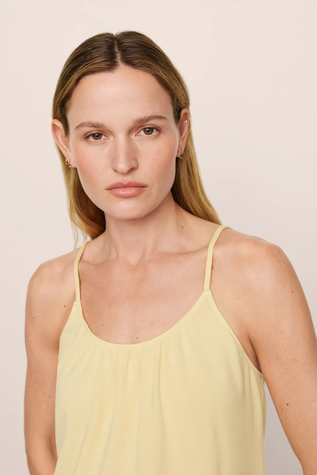 Model is wearing Gisele TENCEL™ Modal Ruffle Cami & Shortie Short Set in  Sunrise