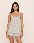 Model is wearing Gisele TENCEL™ Printed Modal Ruffle Cami & Shortie Short Set in Tide Dot Ivory