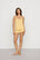 Model is wearing Frida TENCEL™ Modal Cami & Shortie Short PJ Set in Sunbeam/Ivory