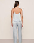 Model is wearing Washable Silk Lace Cami & Pant Set  in Powder Blue/Champagne