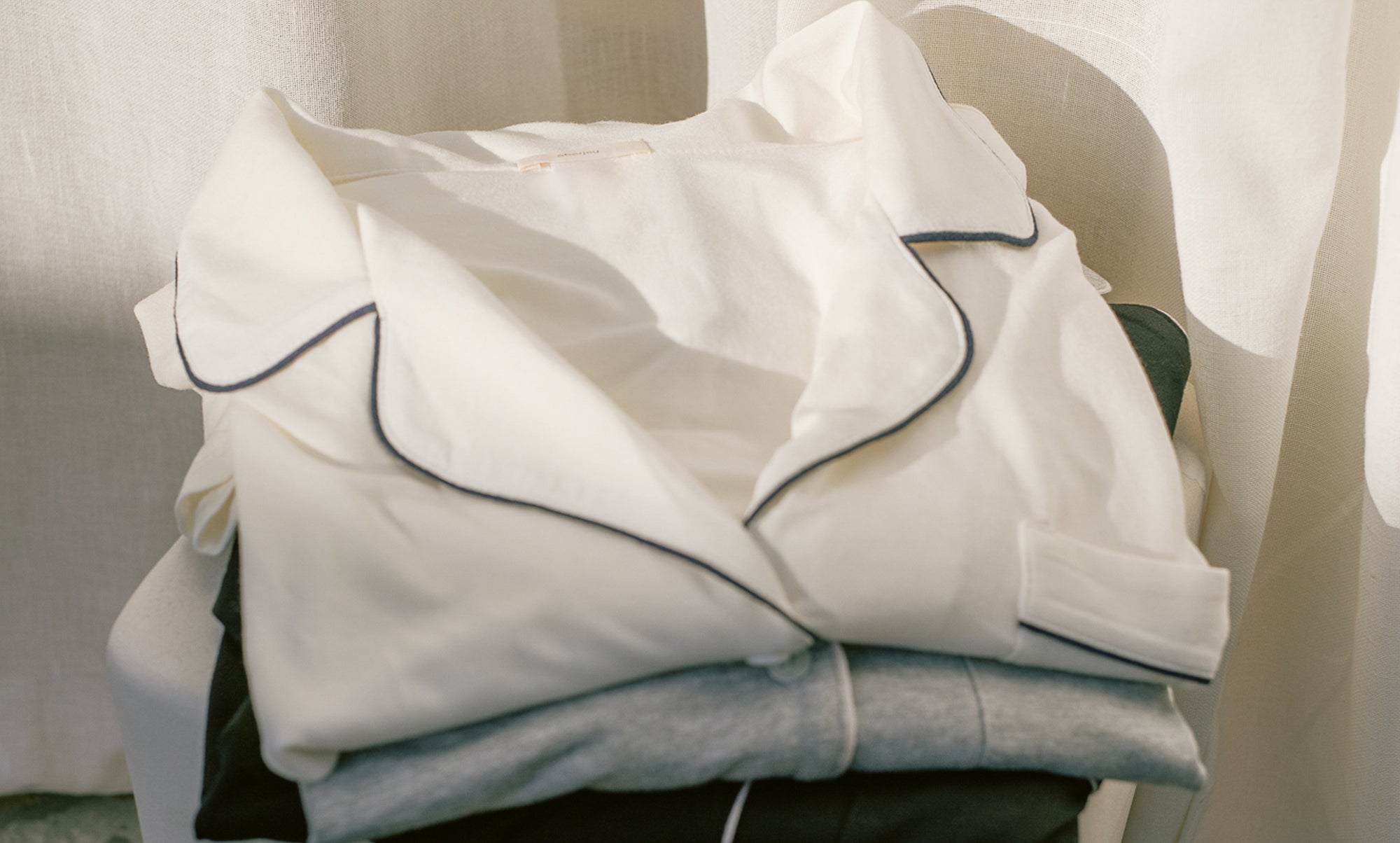 Image of stack of Gisele TENCEL™ Modal Long PJs