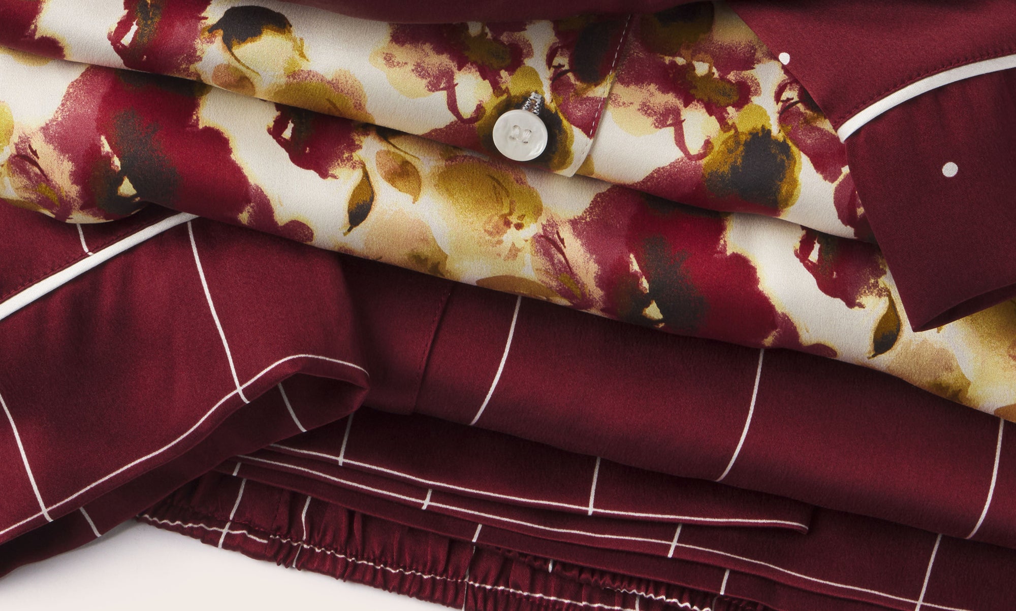 Stack of Silk PJS from the Eberjey x Lily Aldridge Collection
