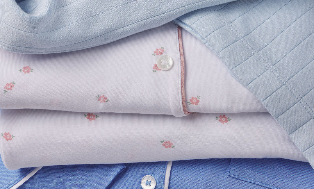Stack of Gisele PJs in nantucket breeze, summer daisy and cornflower blue